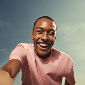 Young man smiling taking a selfie