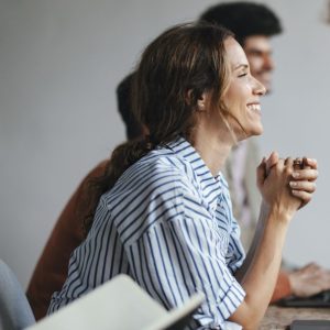 Women in a meeting with people
